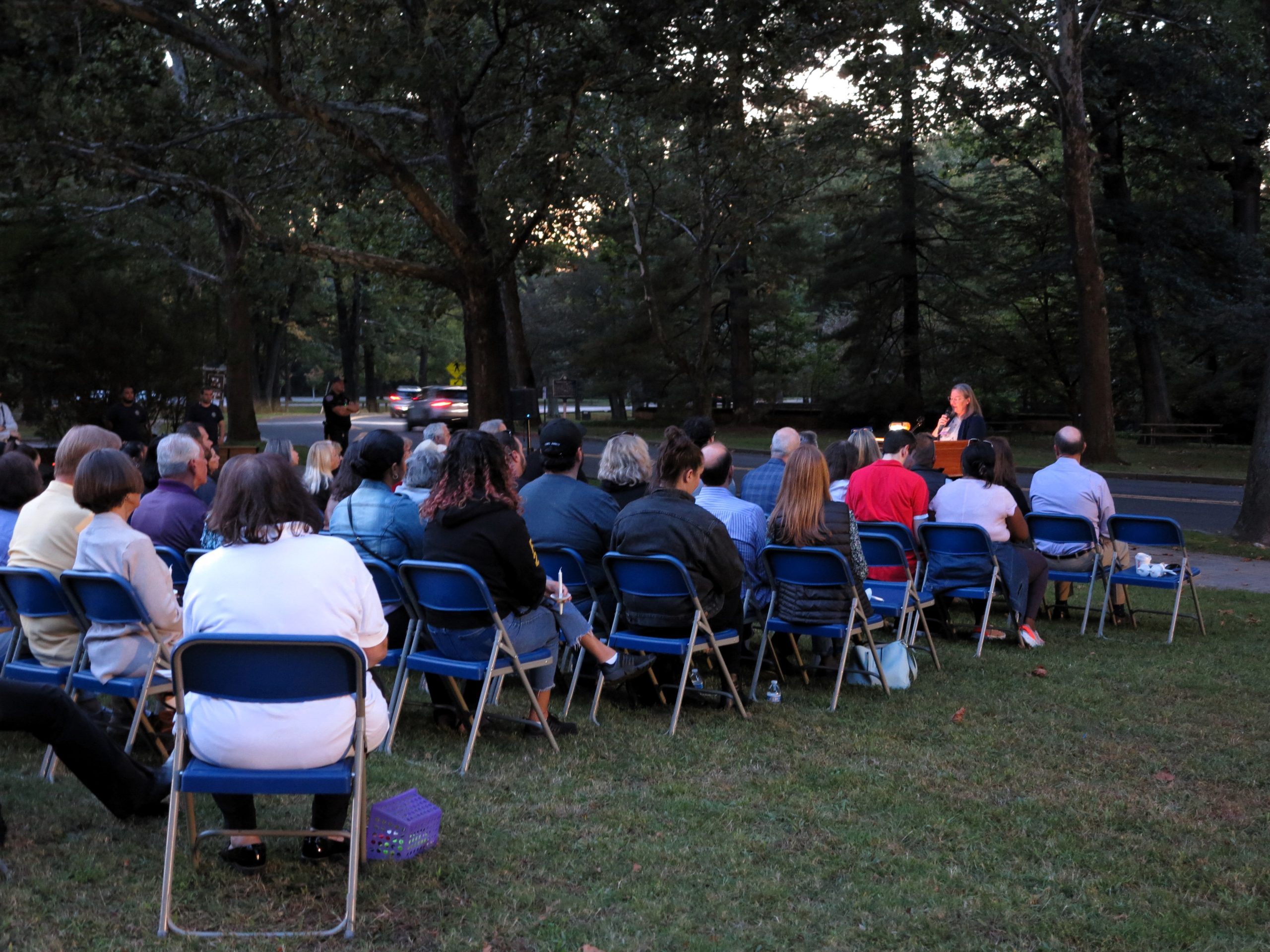 Attendees listening to Executive Director Julye Myner speak during 2023 Vigil